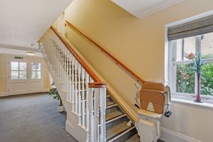 Communal Hallway with stairlift- click for photo gallery